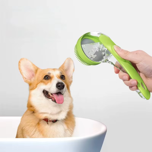 Green CoatKind pet bath brush shown with a dog